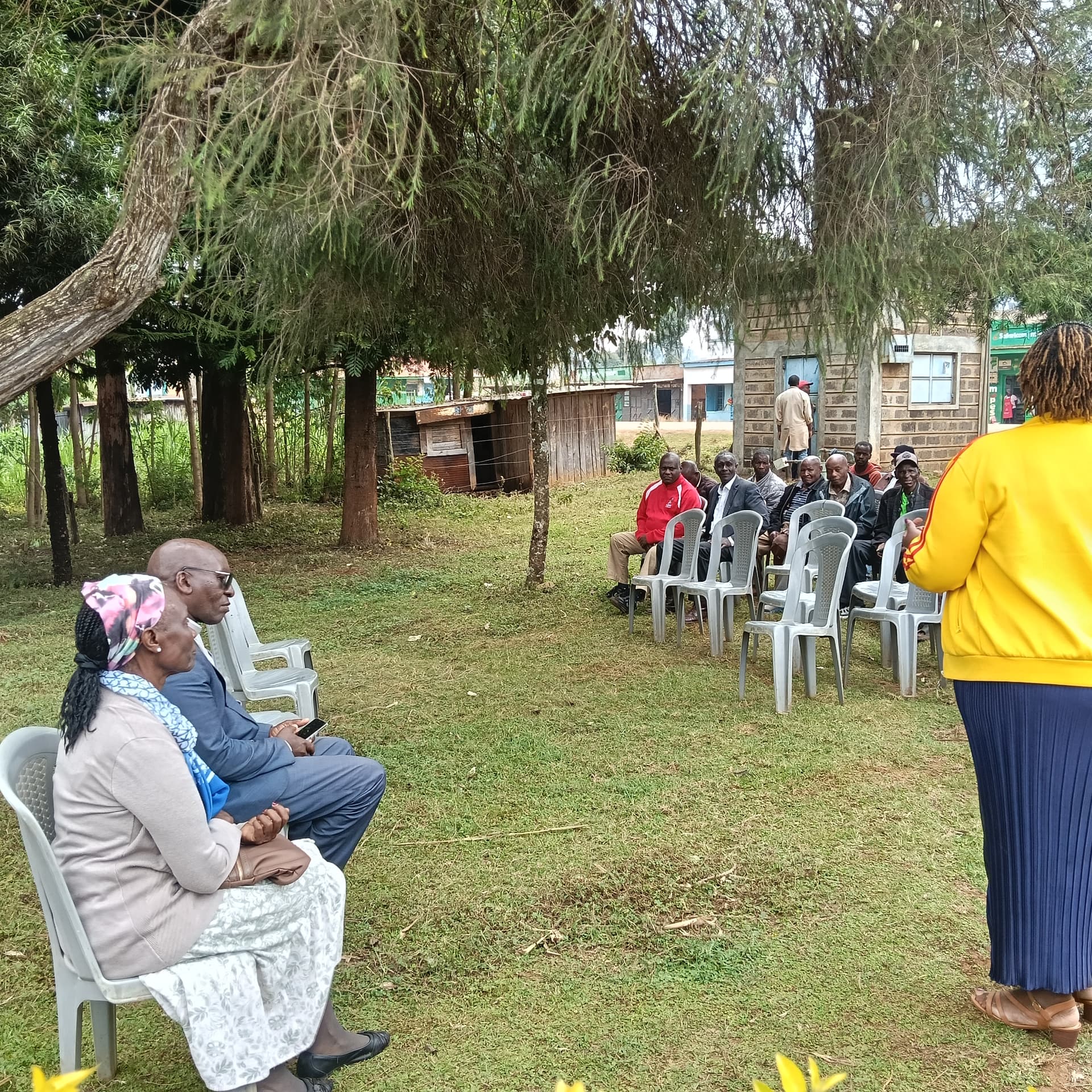 AYHEM community members gathered in the town square at Kagaa Village, Kenya