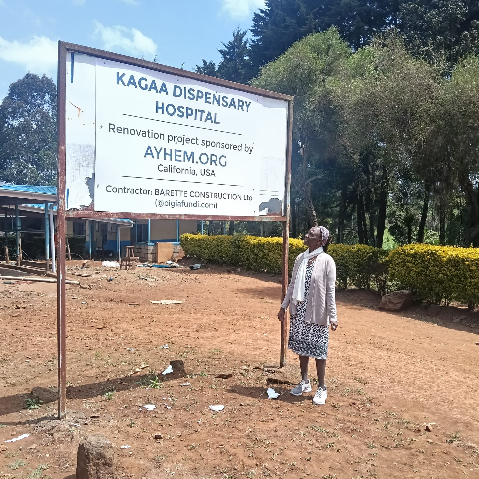 Signboard at Kagaa Dispensary Hospital marking the renovation project sponsored by AYHEM